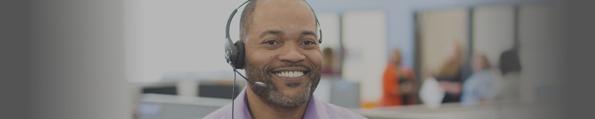 Person smiling with headset